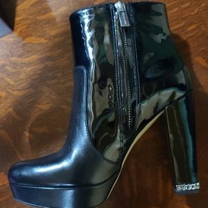 Michael Kors patent leather stacked boots